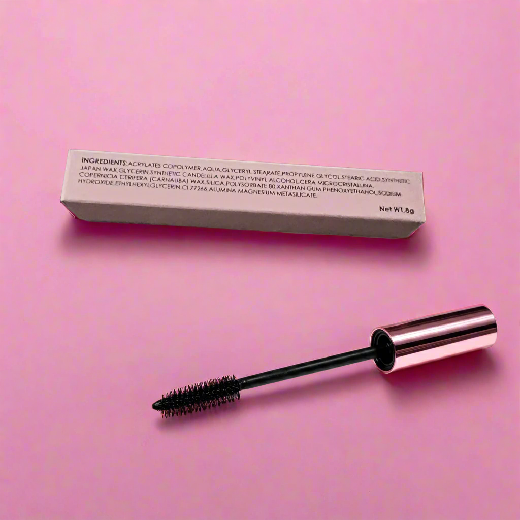 VP Boutique LuxeFlex mascara for volume and comfort with applicator wand and packaging on pink background