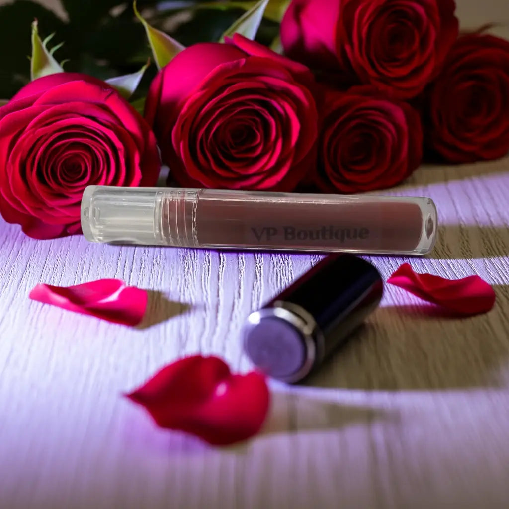 VP Boutique waterproof liquid lipstick with smudge proof formula displayed with red roses and petals