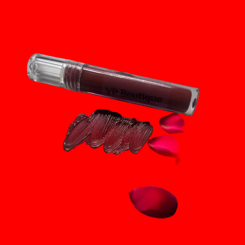 VP Boutique smudge proof waterproof liquid lipstick with red roses and swatch on white surface