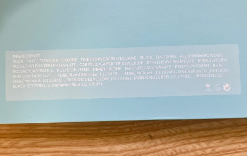 Vickipboutique ocean inspired makeup palette ingredient list on light blue packaging